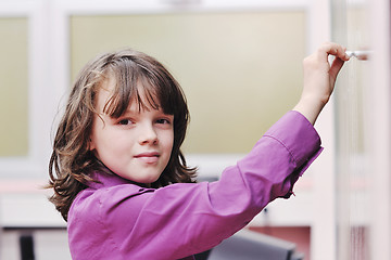 Image showing happy school girl on math classes