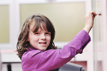 Image showing happy school girl on math classes