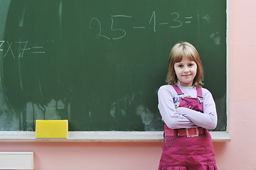 Image showing happy school girl on math classes