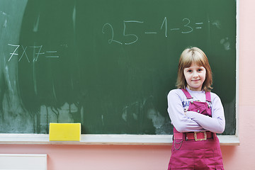 Image showing happy school girl on math classes