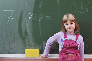 Image showing happy school girl on math classes