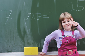 Image showing happy school girl on math classes