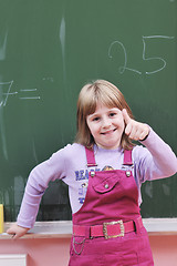 Image showing happy school girl on math classes