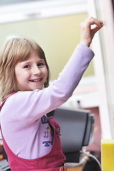Image showing happy school girl on math classes