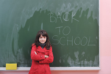 Image showing happy school girl on math classes