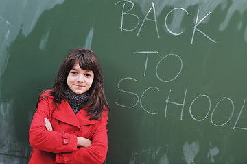 Image showing happy school girl on math classes