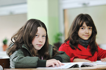 Image showing happy child  in schoold have fun and learning leassos