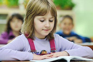 Image showing happy child  in schoold have fun and learning leassos