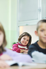 Image showing happy child  in schoold have fun and learning leassos