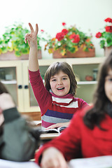 Image showing happy child  in schoold have fun and learning leassos