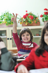 Image showing happy child  in schoold have fun and learning leassos