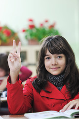 Image showing happy child  in schoold have fun and learning leassos