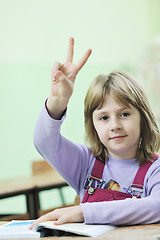 Image showing happy child  in schoold have fun and learning leassos