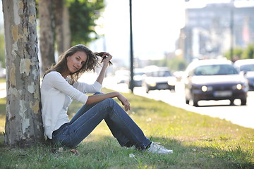 Image showing young woman havefun at street 