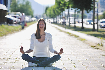 Image showing yoga at sunny street