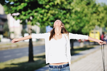 Image showing young woman havefun at street 