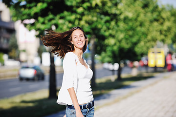 Image showing young woman havefun at street 