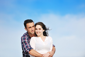 Image showing happy young couple have fun on beach