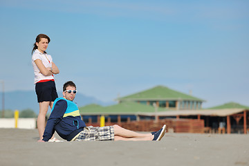 Image showing happy young couple have fun on beach