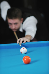 Image showing young man play pro billiard game 