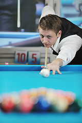 Image showing young man play pro billiard game 