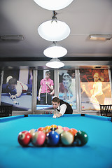 Image showing young man play pro billiard game 