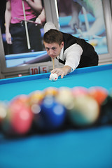 Image showing young man play pro billiard game 