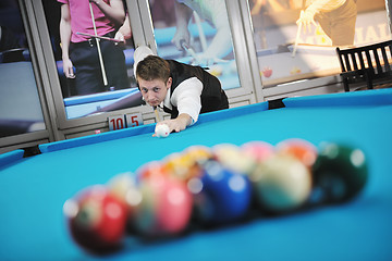 Image showing young man play pro billiard game 