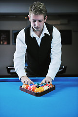 Image showing young man play pro billiard game 