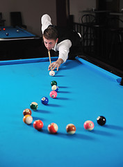 Image showing young man play pro billiard game 