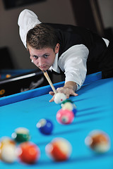 Image showing young man play pro billiard game 