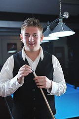 Image showing young man play pro billiard game 