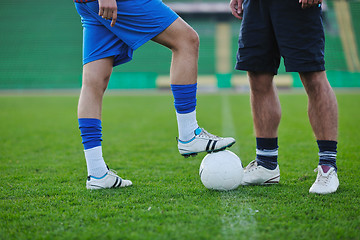 Image showing football players in competition for the ball