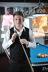 Image showing young man play pro billiard game 