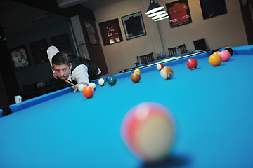 Image showing young man play pro billiard game 