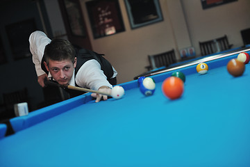 Image showing young man play pro billiard game 