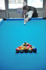 Image showing young man play pro billiard game 