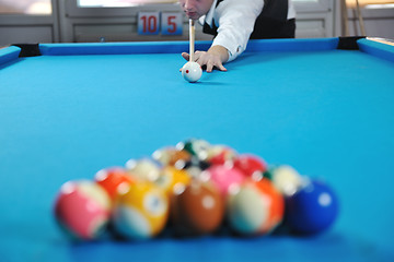 Image showing young man play pro billiard game 