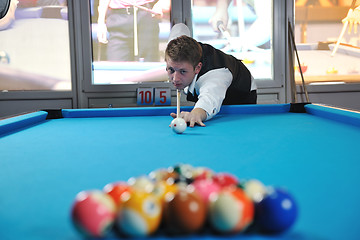 Image showing young man play pro billiard game 