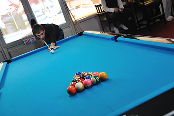 Image showing young man play pro billiard game 