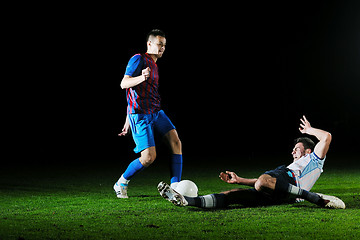 Image showing football players in competition for the ball