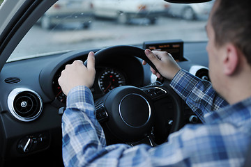 Image showing man using car navigation