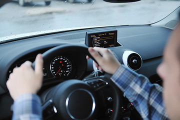 Image showing man using car navigation