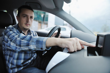 Image showing man using car navigation