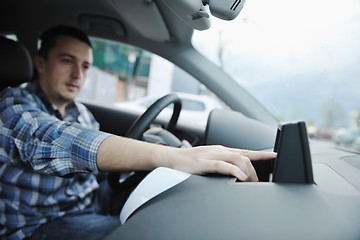 Image showing man using car navigation