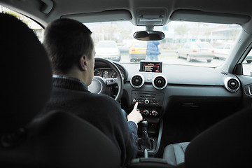 Image showing man using car navigation