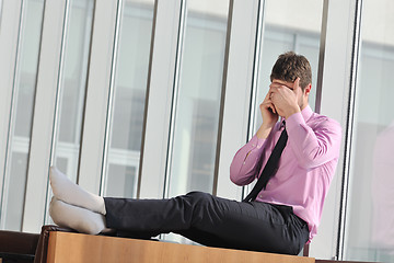 Image showing young business man talk by cellphone