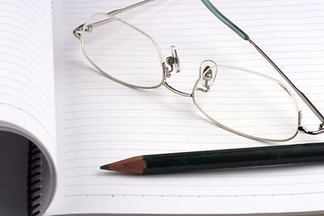 Image showing Pencil and note book