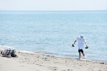 Image showing happy young couple have fun on beach