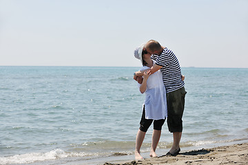 Image showing happy young couple have fun on beach